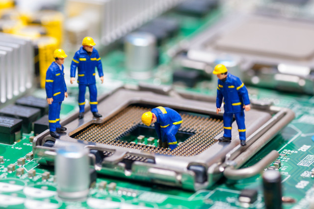 Close up computer motherboard workers free wallpaper - medium preview image
