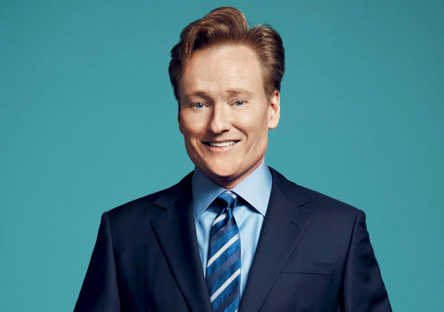Man in suit smiling blue #2 free wallpaper - medium preview image