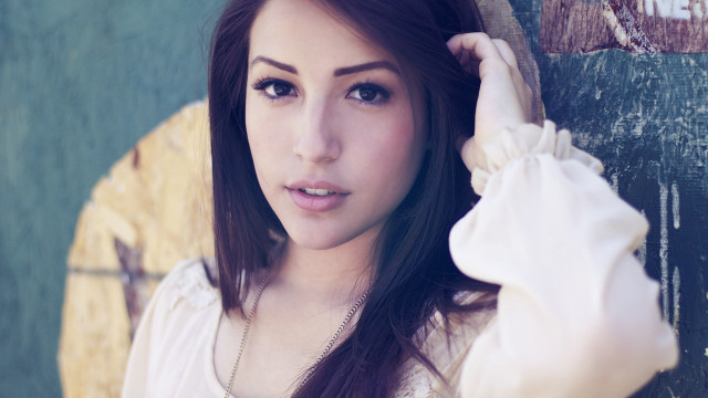 Woman long hair leaning wall #3 free wallpaper - medium preview image