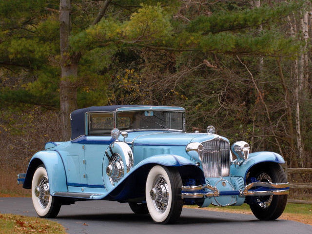 Blue car driving forest road free wallpaper - medium preview image