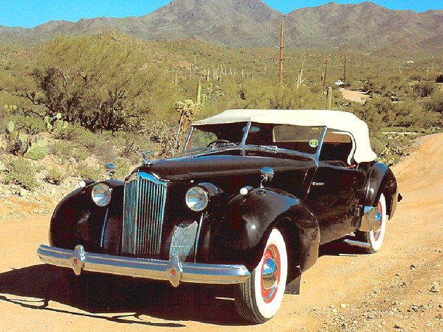 Old black car dirt road free wallpaper - medium preview image