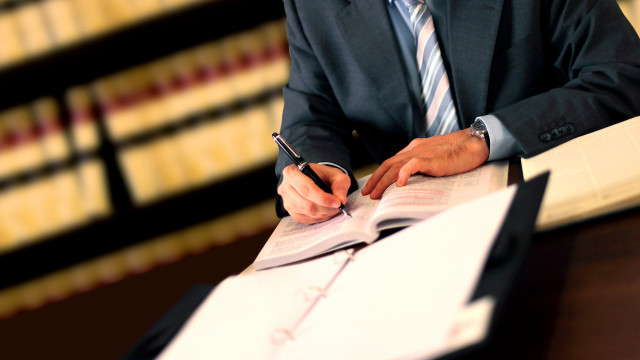 Man suit tie writing pen free wallpaper - medium preview image