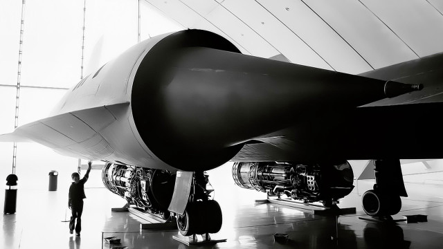 Man jet engine hangar looking free wallpaper - medium preview image