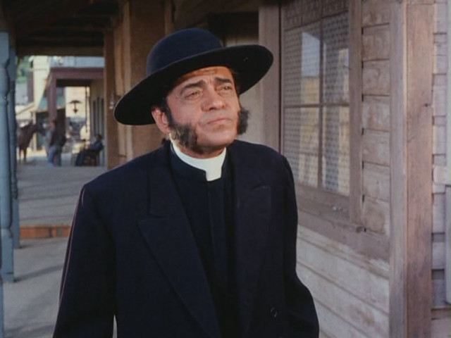 Man black hat coat building free wallpaper - medium preview image