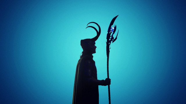 Horned man statue backlit staff free wallpaper - medium preview image