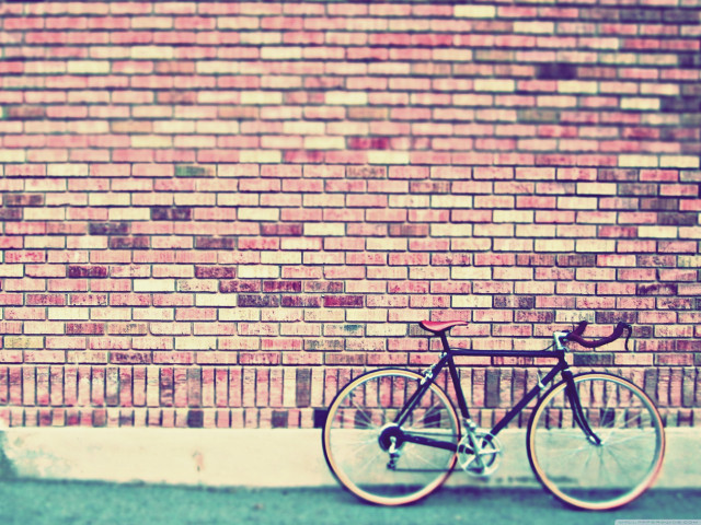 Bicycle brick wall sidewalk building free wallpaper - medium preview image