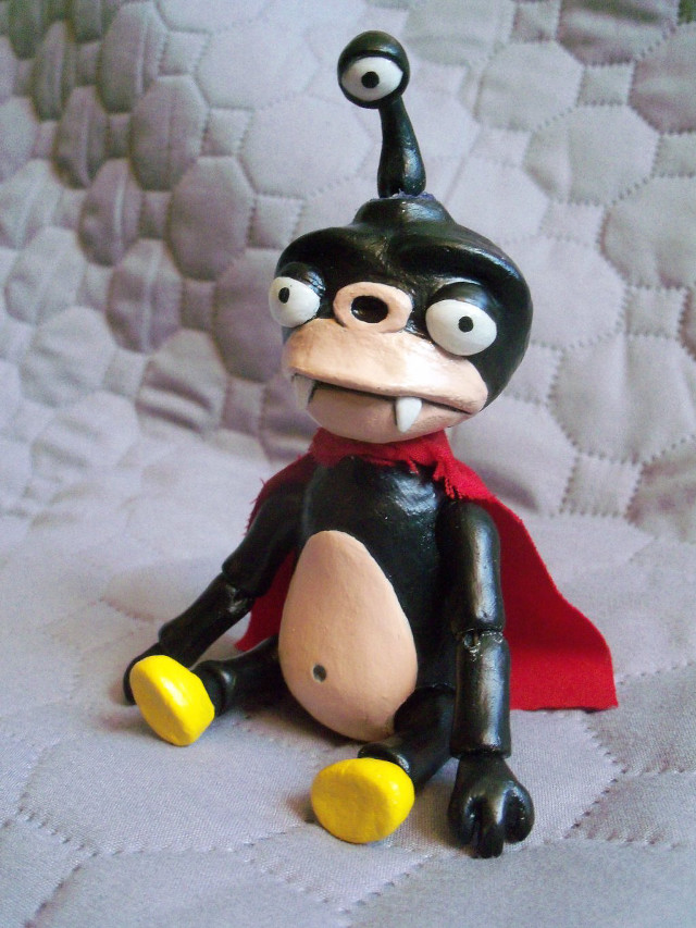 Toy figure cartoon character bed free wallpaper - medium preview image
