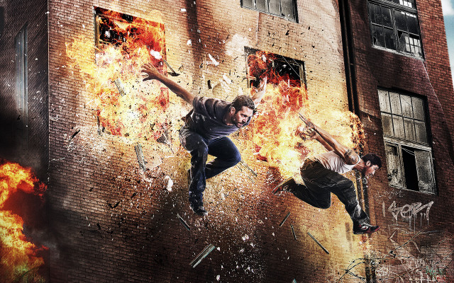 Man jumping skateboard building fire free wallpaper - medium preview image