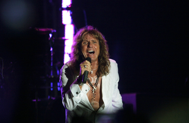 Woman singing microphone dark room free wallpaper - medium preview image