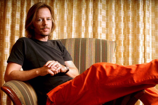 Man sitting chair foot up free wallpaper - medium preview image