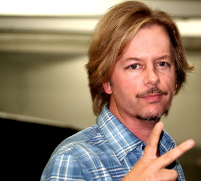 Man mustache blue shirt pointing free wallpaper - medium preview image