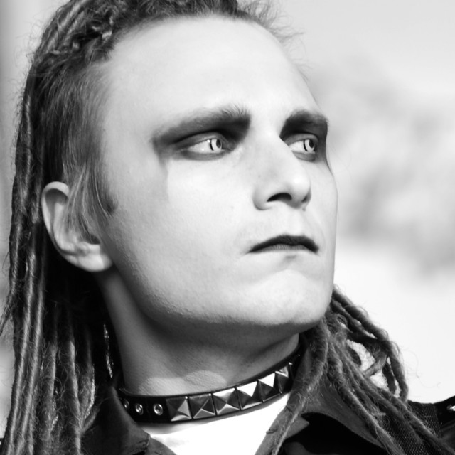 Man dreadlocks tie looking up free wallpaper - medium preview image