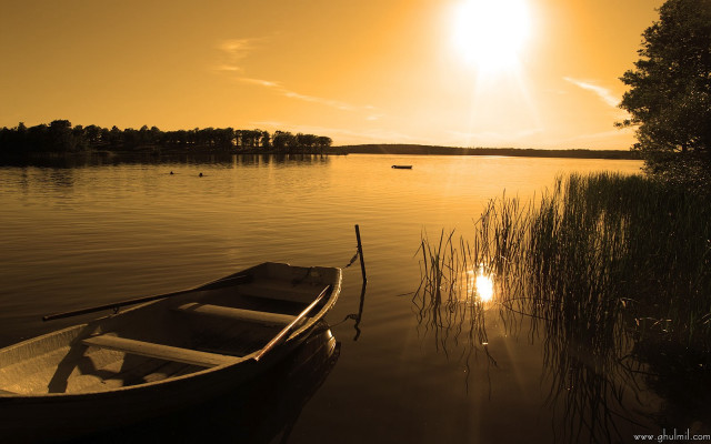 Boat sunset lake cityscape mountain free wallpaper - medium preview image