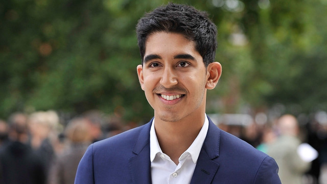 Man smiling suit crowd public free wallpaper - medium preview image
