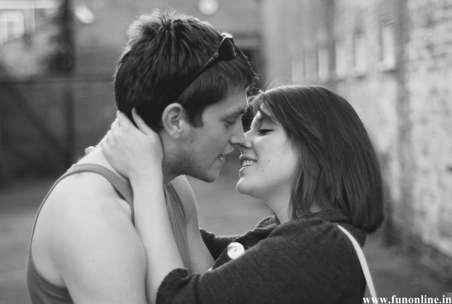 Man woman cuddling black white free wallpaper - medium preview image