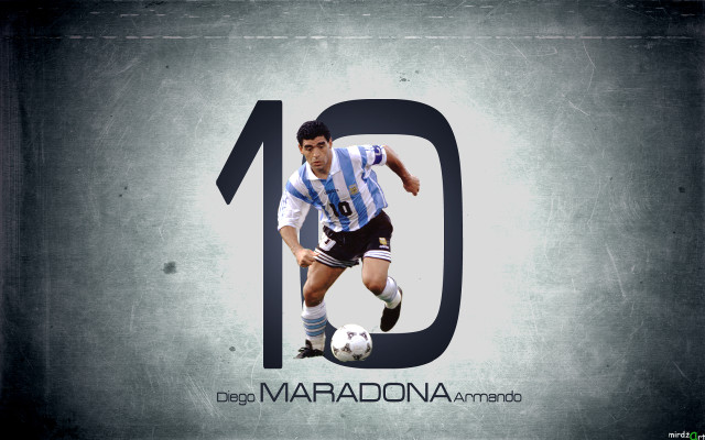 Man blue uniform kicking soccerball free wallpaper - medium preview image