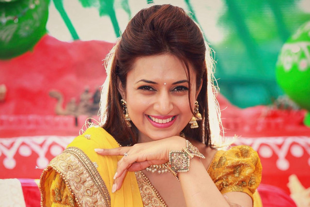 Woman yellow dress smiling hands free wallpaper - medium preview image