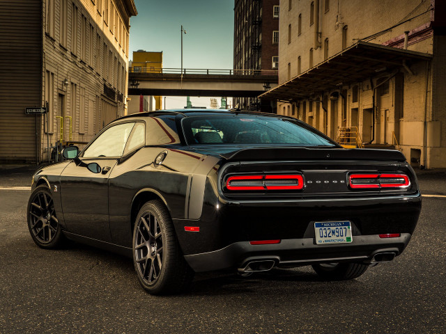 Black sports car city street free wallpaper - medium preview image