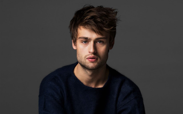 Man blue sweater serious look free wallpaper - medium preview image
