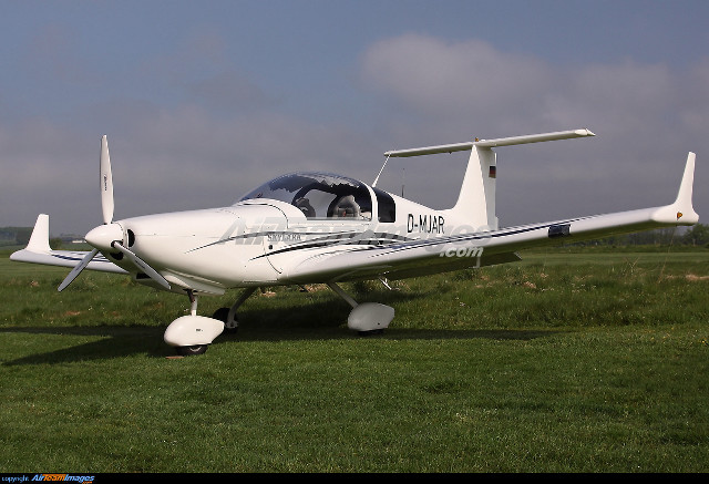 Small white plane green field free wallpaper - medium preview image