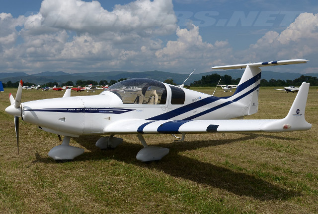Small airplane grass field trees free wallpaper - medium preview image