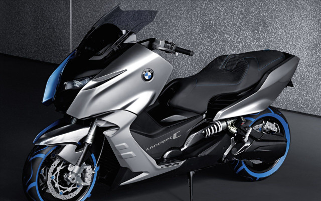 Silver blue motorcycle parked room free wallpaper - medium preview image