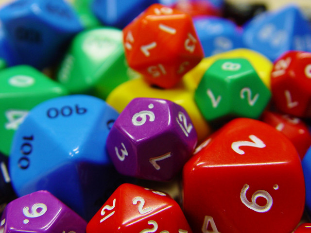 Colorful dice pile tabletop white free wallpaper - medium preview image