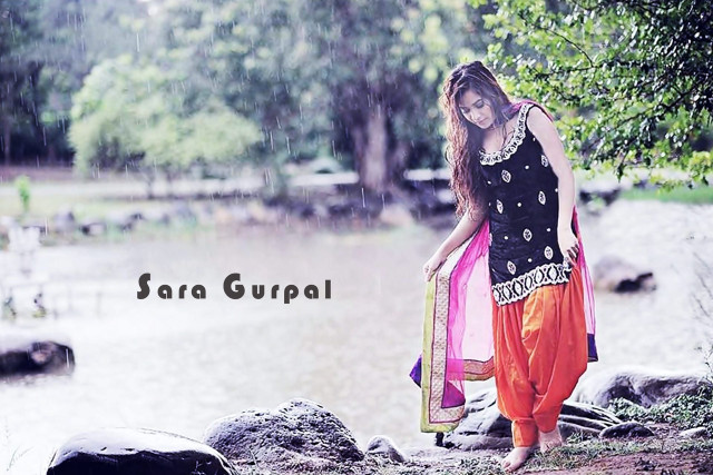 Woman orange pants rain river free wallpaper - medium preview image