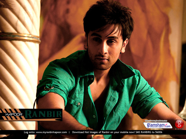 Man green shirt tie sitting free wallpaper - medium preview image