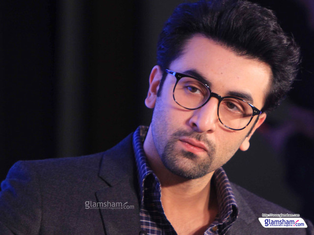 Man glasses serious look camera free wallpaper - medium preview image