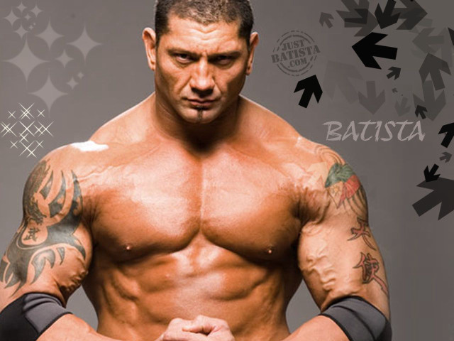 Man tattoo gloves holding camera #2 free wallpaper - medium preview image