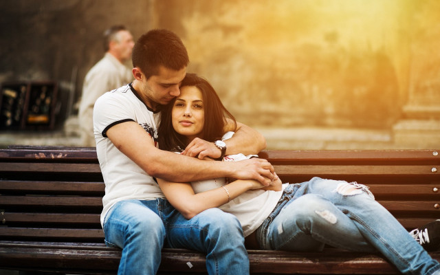 Romantic couple hugging bench stand free wallpaper - medium preview image