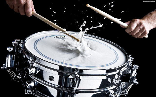 Person playing drum splashing white free wallpaper - medium preview image