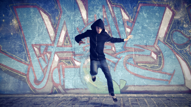 Man black hoodie skateboarding graffiti free wallpaper - medium preview image