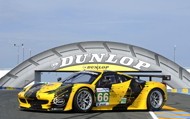 Yellow race car tunnel tires free wallpaper - medium preview image