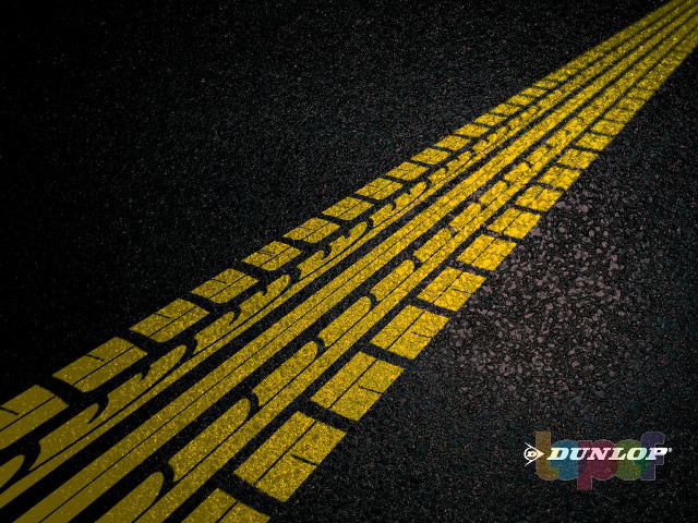 Yellow line tire tread night free wallpaper - medium preview image