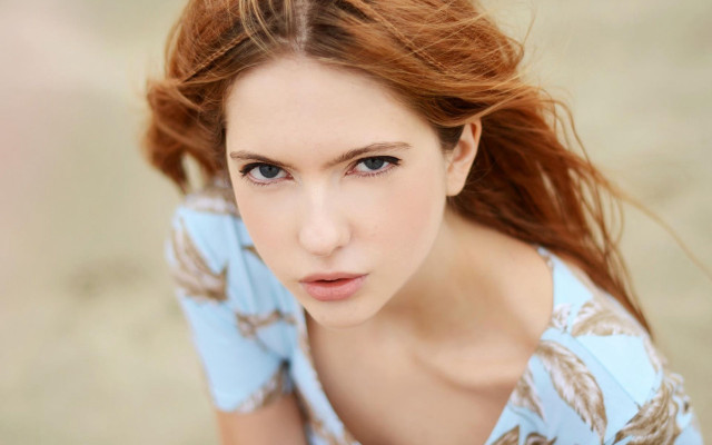 Red haired woman blowing wind #3 free wallpaper - medium preview image