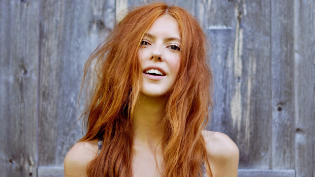 Woman red hair smiling posing #2 free wallpaper - medium preview image