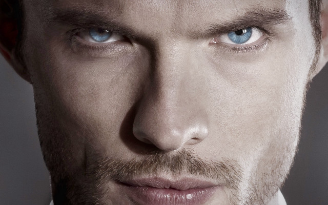 Man blue eyes serious tie free wallpaper - medium preview image