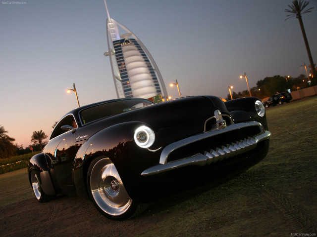 Black car tall building night free wallpaper - medium preview image
