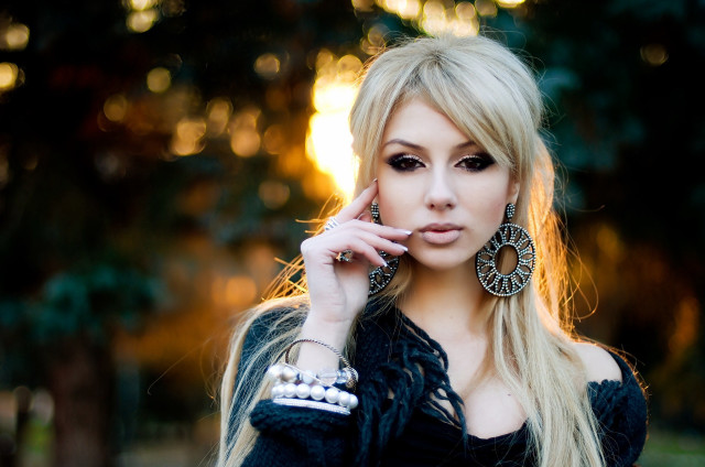 Woman blonde hair earrings cell free wallpaper - medium preview image