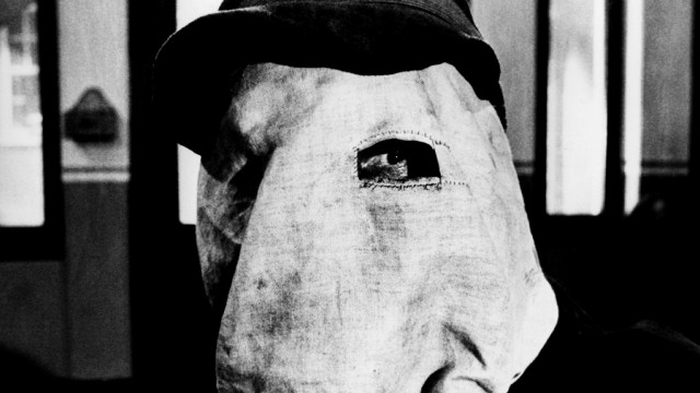 Masked person window seat train free wallpaper - medium preview image