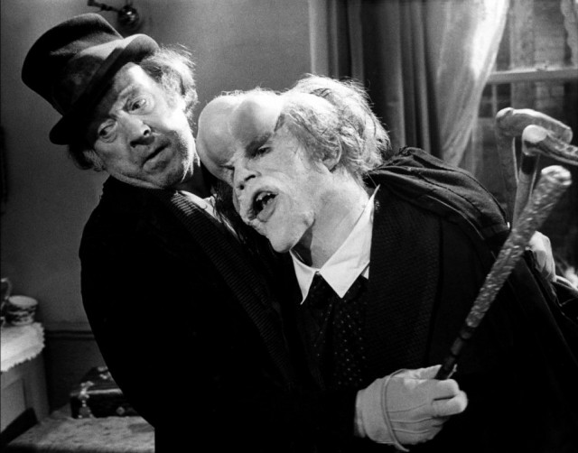 Man hugging man room broom free wallpaper - medium preview image
