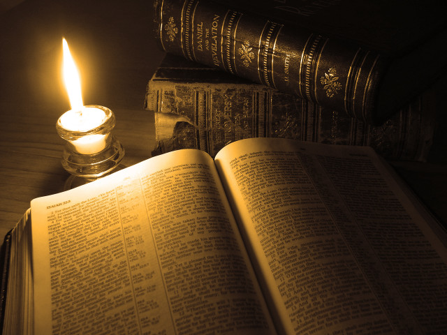 Candle lit book table candle free wallpaper - medium preview image