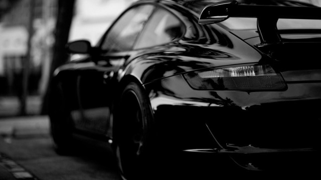 Black car parked road building #5 free wallpaper - medium preview image