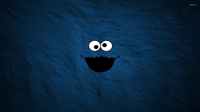 Blue furry animal smiling face free wallpaper - medium preview image