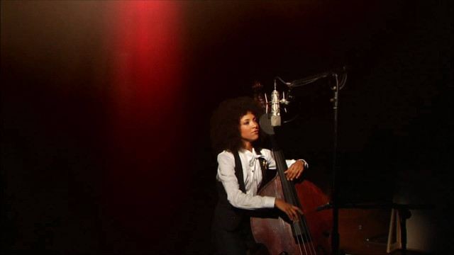 Woman microphone bass dark room free wallpaper - medium preview image