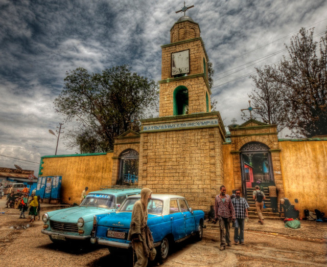 Cars parked building clock tower free wallpaper - medium preview image