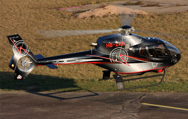 Helicopter parked field grass hose free wallpaper - medium preview image