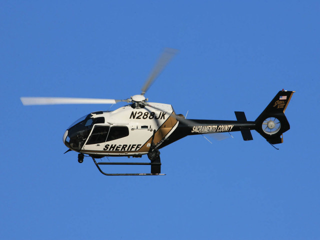 Helicopter flying blue sky propeller free wallpaper - medium preview image